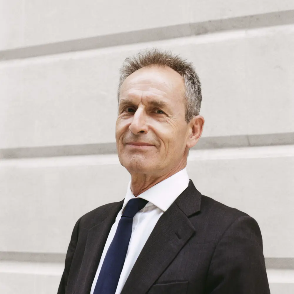 Headshot of Stephen Cohen standing outside a building