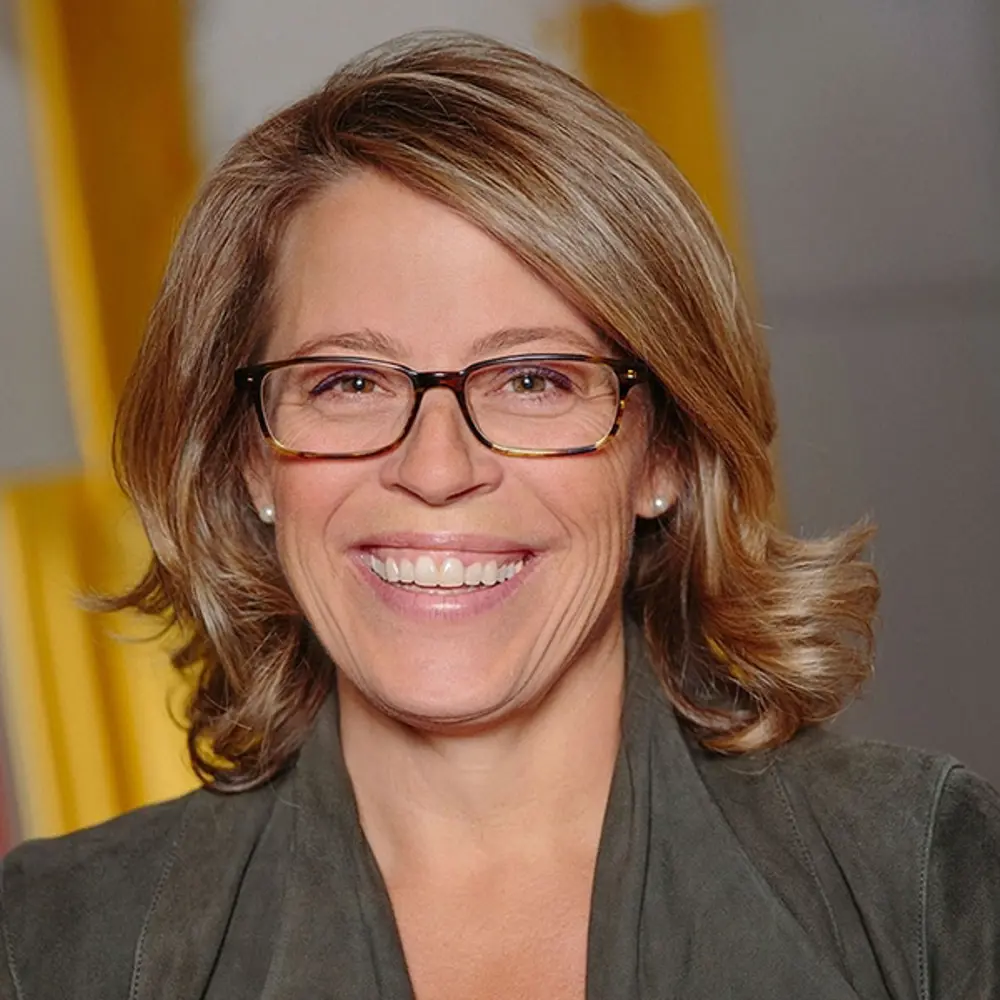 Photo of Katie Rae smiling at the camera