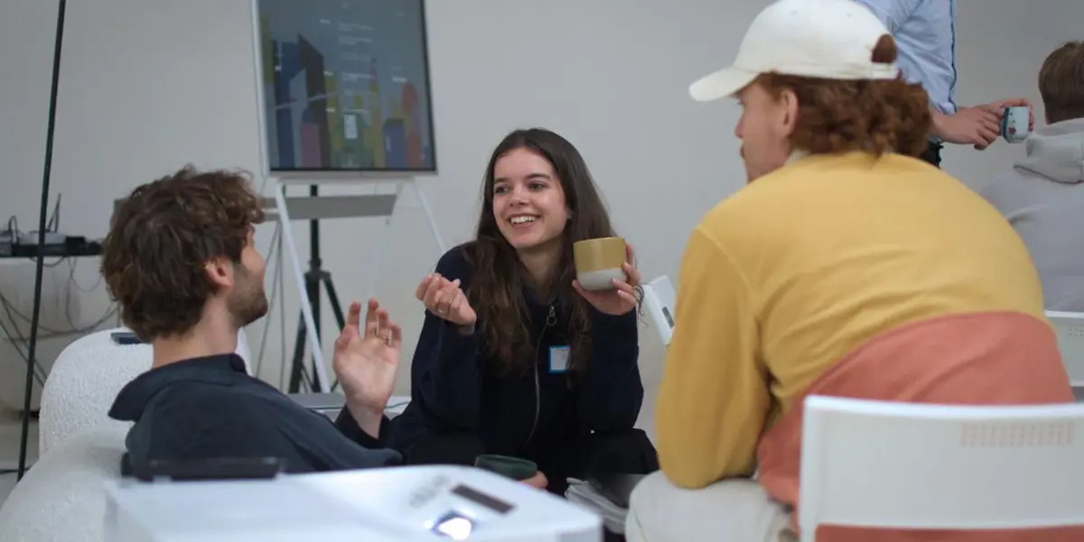 Group of people chatting at one of ARIA's Innovator Circle pilots